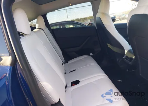 2023 Tesla Model Y Awd/Long Range Dual Motor All-Wheel Drive z USA, uszkodzony, nr VIN 7SAYGAEE6PF683829